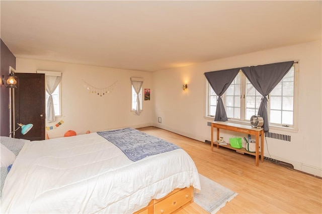 bedroom featuring light hardwood / wood-style floors