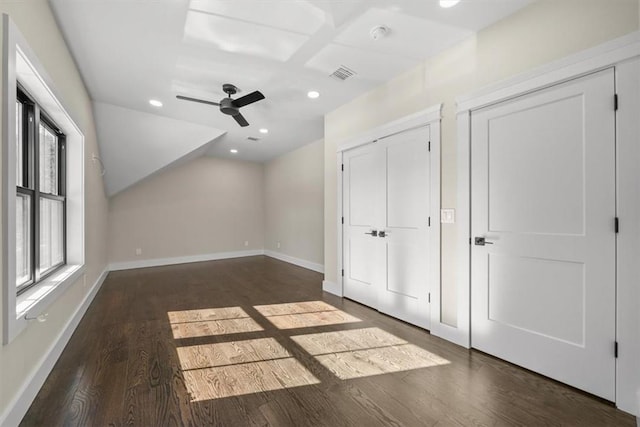 additional living space featuring dark hardwood / wood-style flooring and ceiling fan