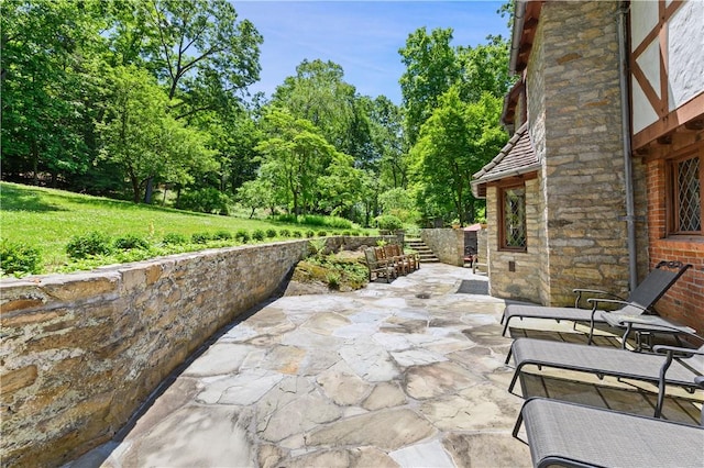 view of patio / terrace with stairway