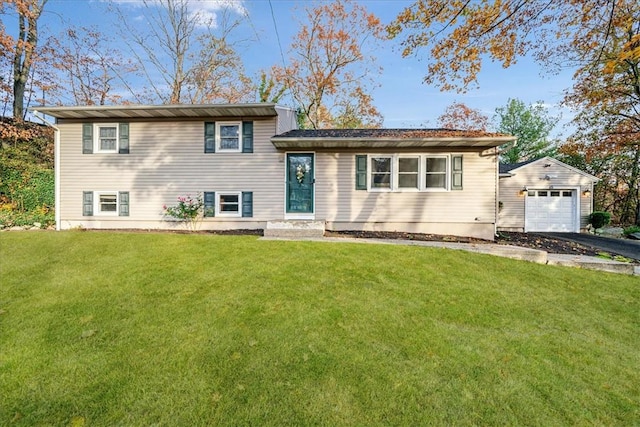 split level home with a garage and a front yard