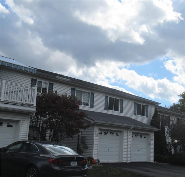 front of property with a garage