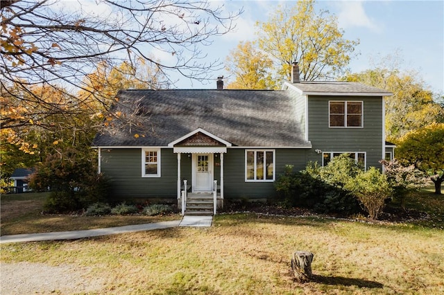 view of front of house with a front lawn