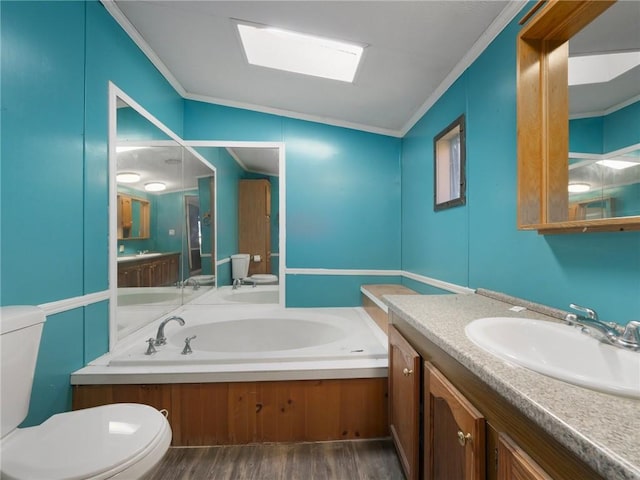 bathroom with a bathing tub, crown molding, vaulted ceiling, toilet, and wood-type flooring