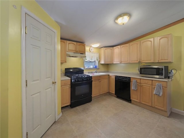 kitchen with light brown cabinets, light tile patterned flooring, black appliances, and ornamental molding