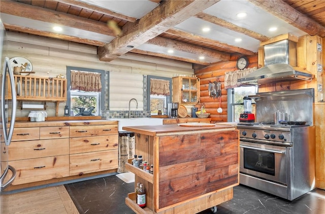 kitchen featuring beam ceiling, wooden ceiling, exhaust hood, and appliances with stainless steel finishes