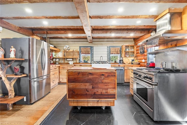 kitchen with light brown cabinets, sink, stainless steel appliances, wood counters, and range hood