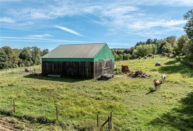 view of outdoor structure featuring a rural view