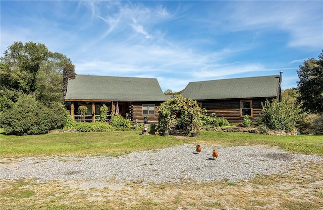 view of log cabin