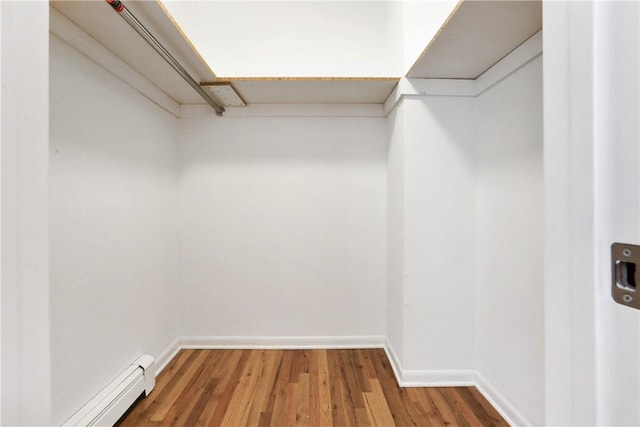 2 Requa St, Briarcliff Manor, NY 10510 - spacious closet featuring baseboard heating and wood finished floors