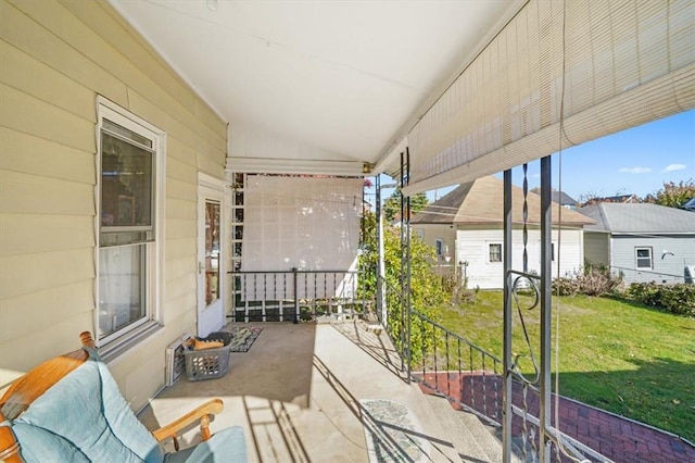 balcony featuring covered porch