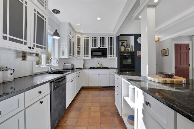 kitchen with black appliances, sink, white cabinetry, decorative light fixtures, and tasteful backsplash