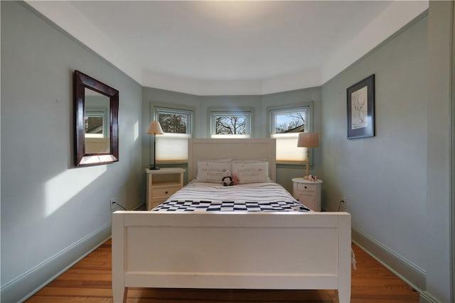 bedroom featuring light hardwood / wood-style floors