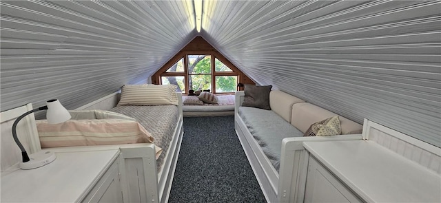 carpeted living room with lofted ceiling