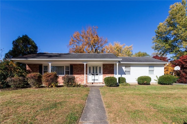 ranch-style house featuring a front lawn