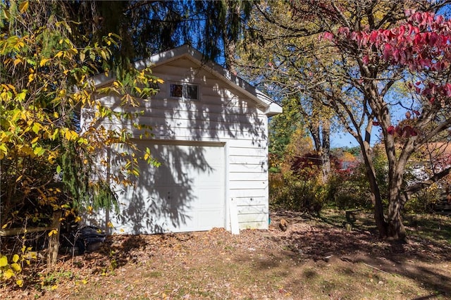 view of outbuilding with a garage