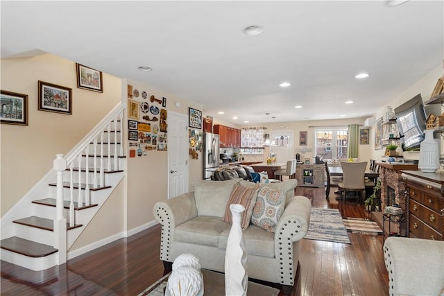 living room featuring dark hardwood / wood-style floors