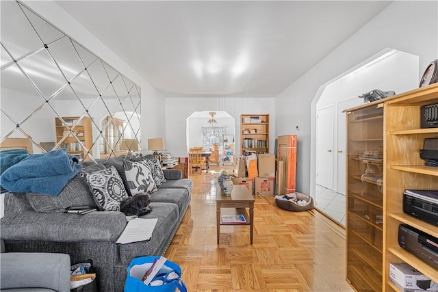 living room featuring parquet flooring