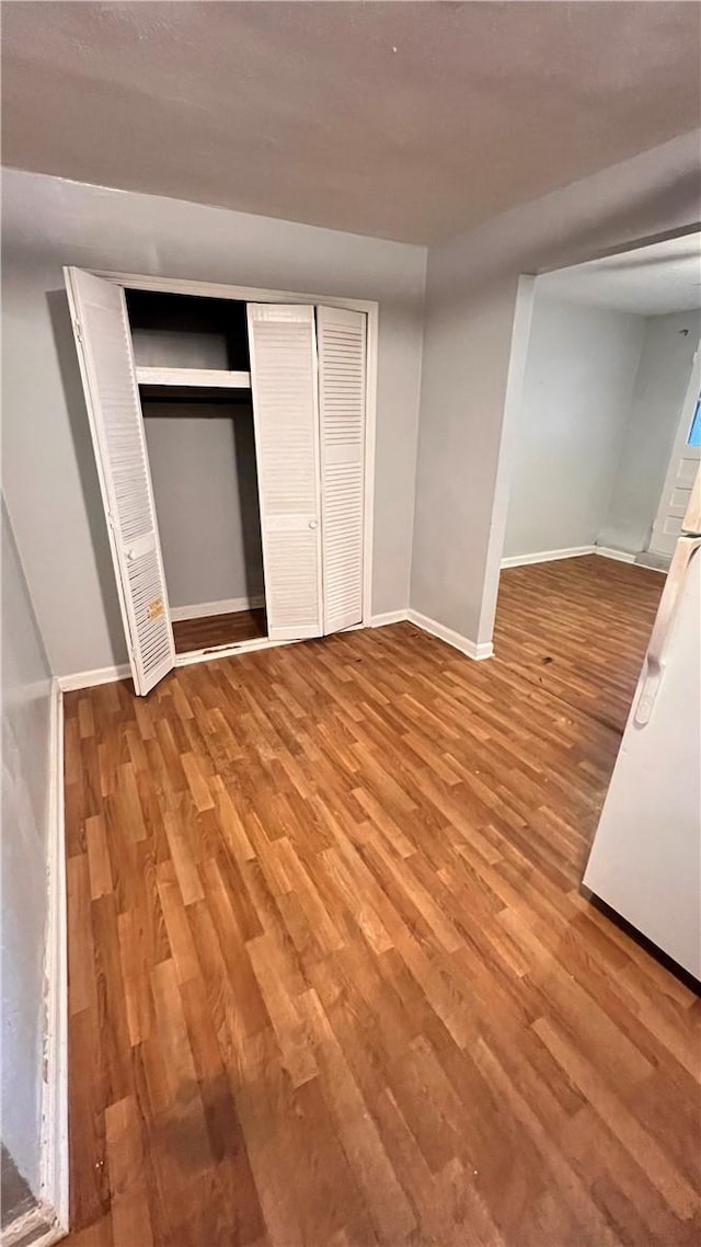 unfurnished bedroom with light wood-type flooring