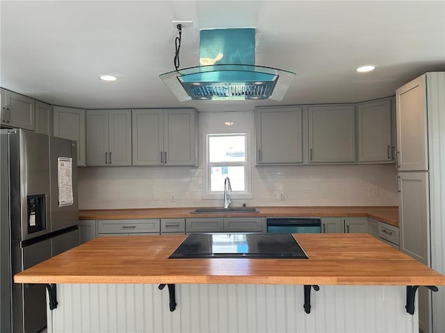 25 Mechanic St, Port Jervis, NY 12771 - kitchen with butcher block counters, stainless steel fridge, a sink, gray cabinets, and recessed lighting