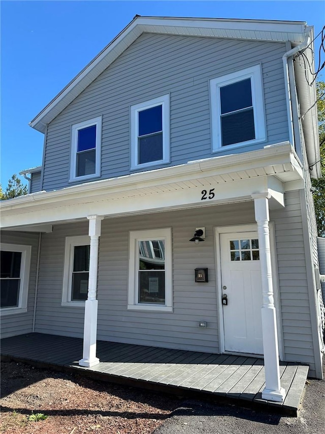 25 Mechanic St, Port Jervis, NY 12771 - traditional home featuring covered porch