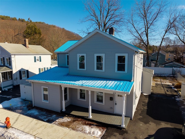 view of front of home featuring covered porch