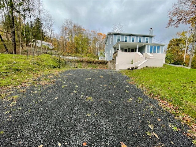 view of front of home with a front yard