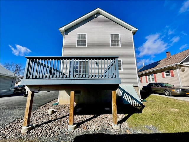 rear view of house with a deck