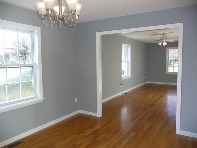 empty room featuring hardwood / wood-style floors and a healthy amount of sunlight