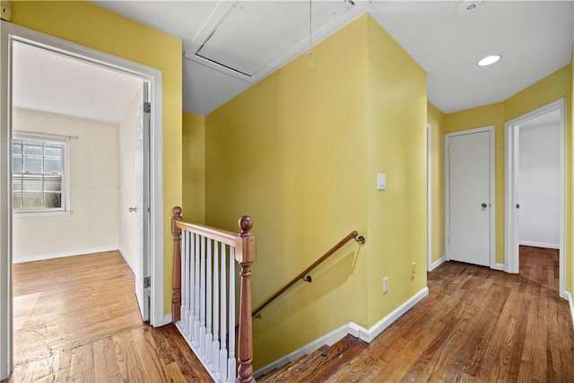 corridor featuring hardwood / wood-style floors