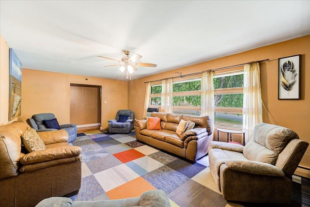 living room with ceiling fan