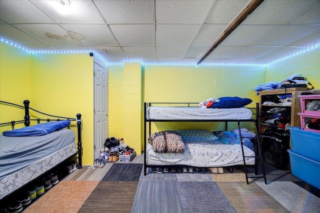 bedroom with a paneled ceiling