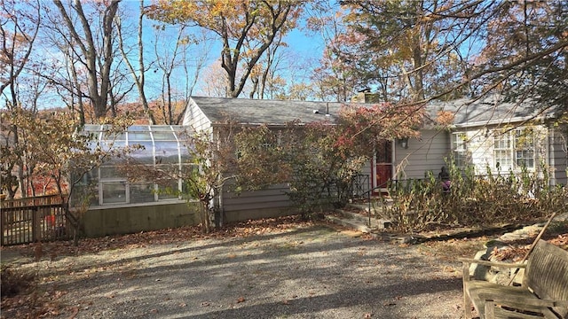 view of front of property with an outbuilding