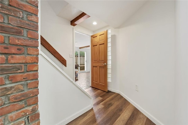 foyer with dark wood-type flooring