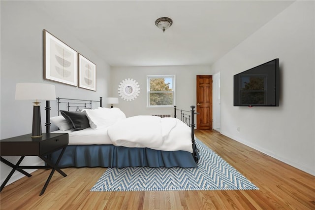 bedroom featuring light hardwood / wood-style flooring