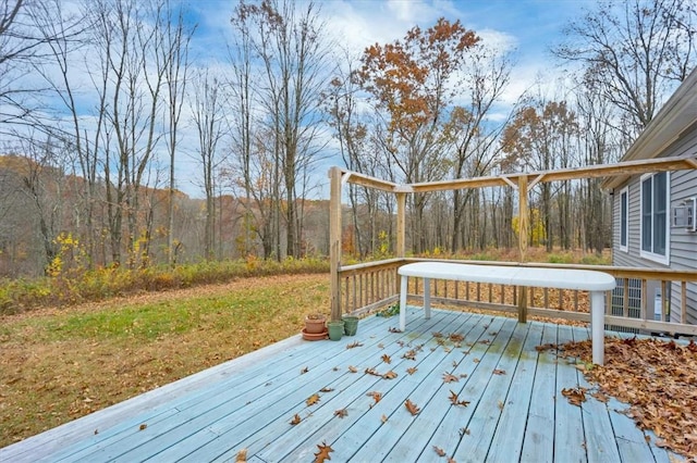 wooden terrace with a yard