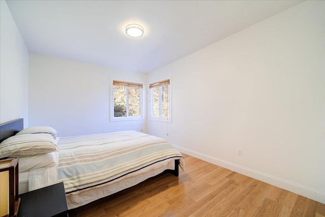 bedroom featuring light hardwood / wood-style floors