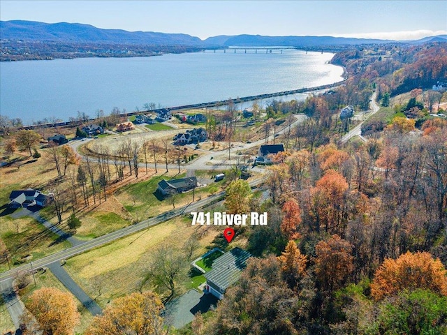 aerial view with a water and mountain view