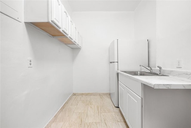 laundry room with sink