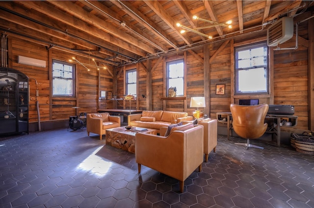 interior space with beam ceiling, a wall unit AC, and wooden ceiling