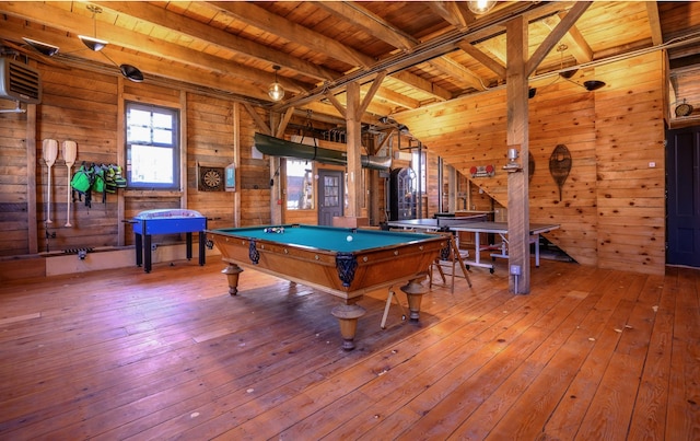 recreation room with wooden ceiling, wooden walls, hardwood / wood-style flooring, pool table, and beamed ceiling