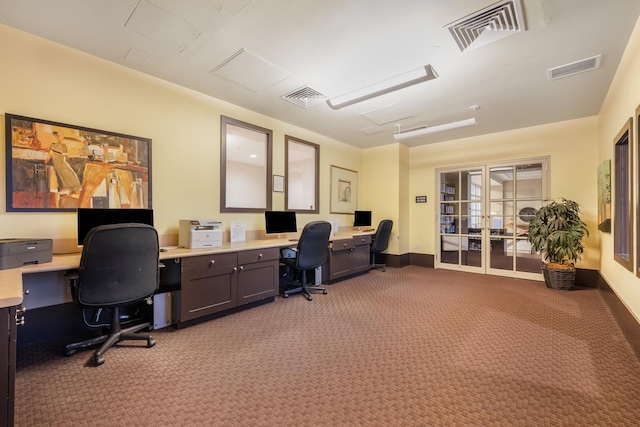 carpeted home office featuring french doors