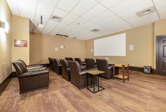 cinema with a paneled ceiling