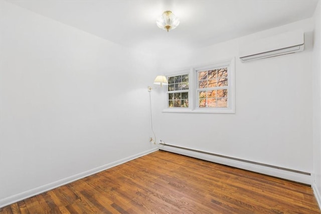 empty room with wood-type flooring, baseboard heating, and a wall mounted AC