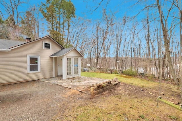 350 W Shore Dr, Carmel, NY 10512 - rear view of house featuring french doors, a patio area, and a yard