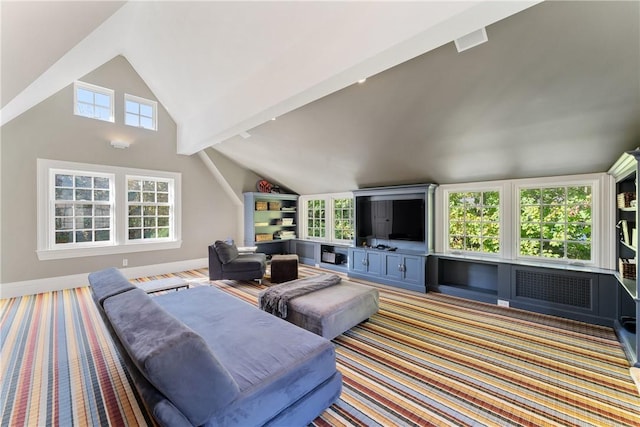 carpeted living room featuring lofted ceiling with beams