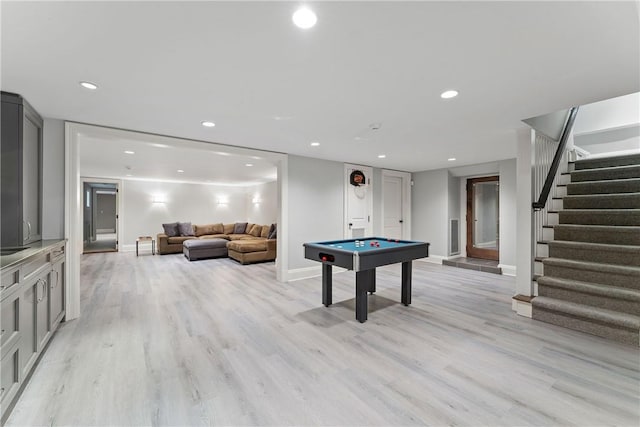 playroom with light hardwood / wood-style flooring and pool table