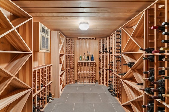 wine room featuring wood ceiling