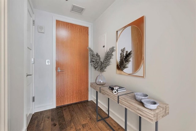 doorway featuring dark hardwood / wood-style flooring