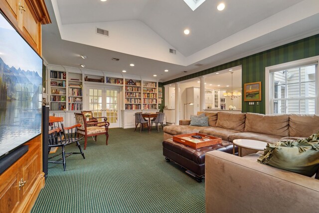 living area with carpet, visible vents, and a wealth of natural light