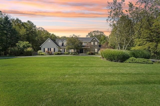 view of front facade with a front lawn